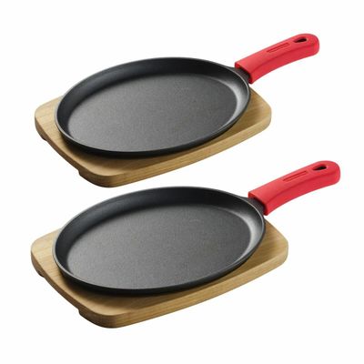 Set de 2 sarténes ovalados con mango de silicona para fajitas. — Hierro fundido.